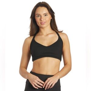 NWT. Year of Ours black ribbed curve sports bra. Size XS